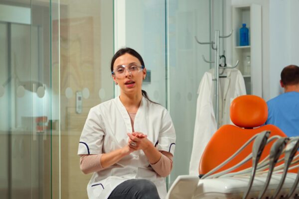 Private Dentist in Birmingham: Is It Worth the Cost During a Dental Emergency? Private dentist in Birmingham treating a patient during a dental emergency.