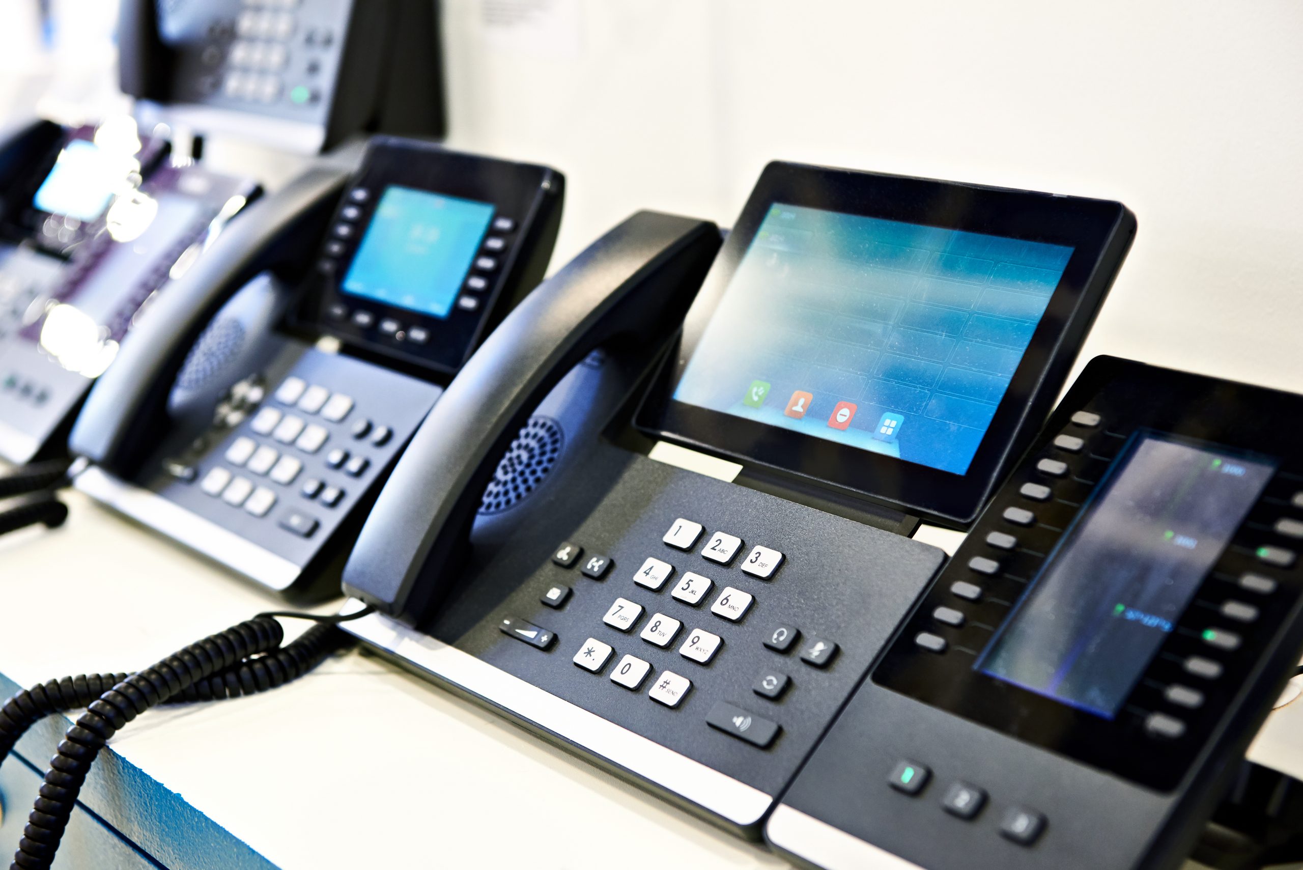 Businessman using Telephone System IP PBX in DIFC Dubai office 2025